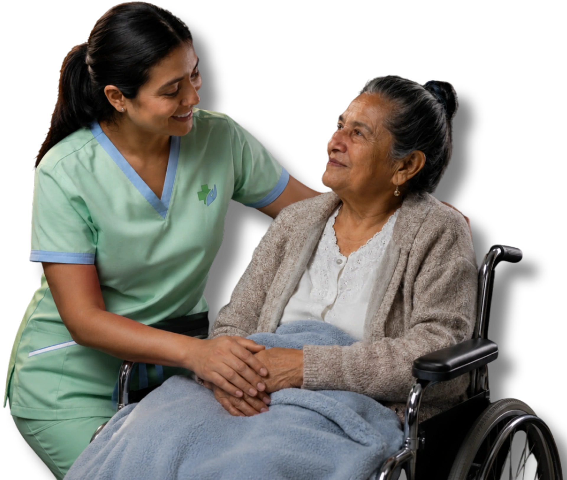 A compassionate nurse gently holding the hands of a patient in a wheelchair